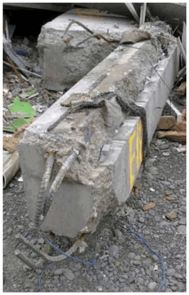 Image of a pre-cast beam from the CTV building after its collapse. Notice the smooth surface on the top where it delaminated from the adjacent slab. This was found to be a possible reason why the building collapsed due to the earthquakes.