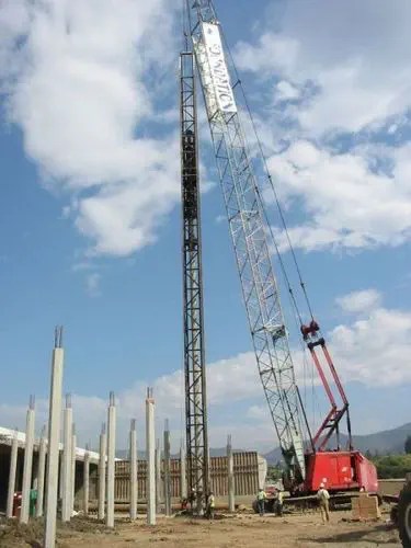 Driven piles being installed on site