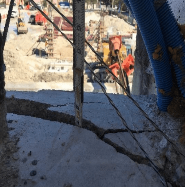 Image of a crack on the FIU Bridge in Miami Florida, prior to its collapse, an example which shows sometimes the experts may not readily tell if a crack is structural and serious in nature.