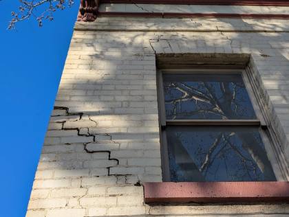 Cracking in Heritage Masonry Buildings: Why the Obvious Answer Was Wrong