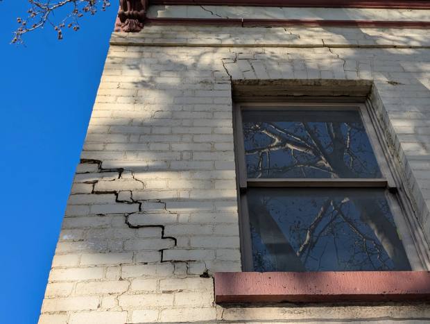 Cracking in Heritage Masonry Buildings: Why the Obvious Answer Was Wrong